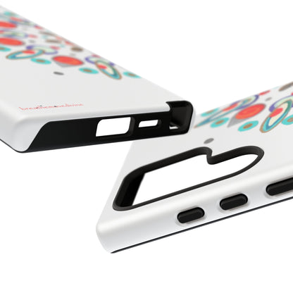 Two phone cases with colorful designs on a white background