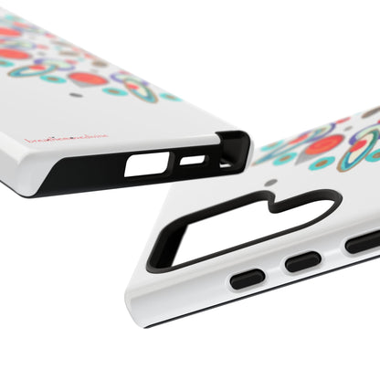 Two phone cases with colorful circular patterns on a white background